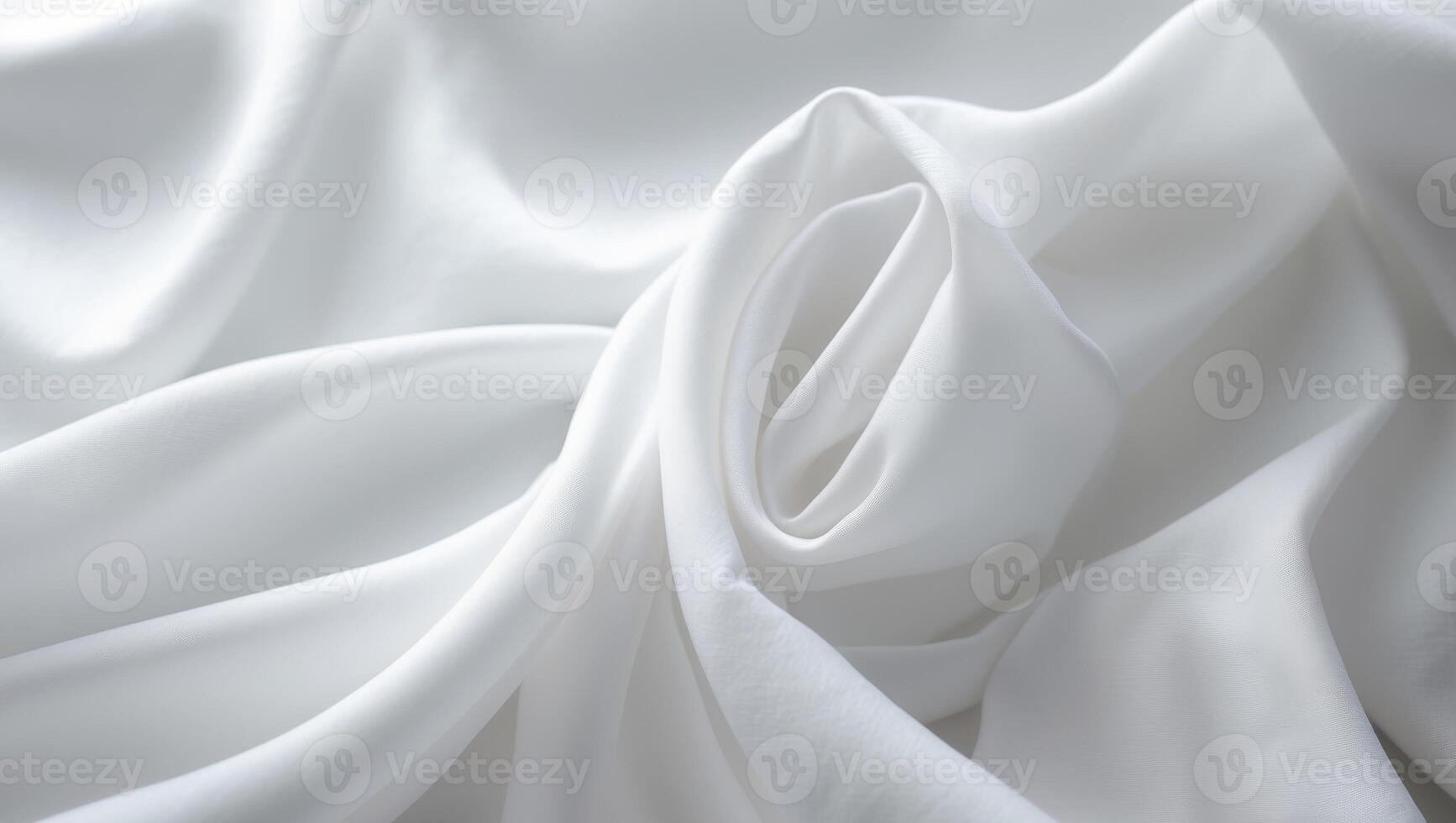 Smooth white fabric with gentle folds and textures. photo