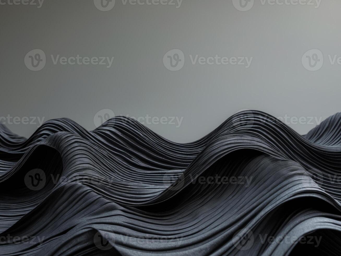 Textured black waves of flowing material photo