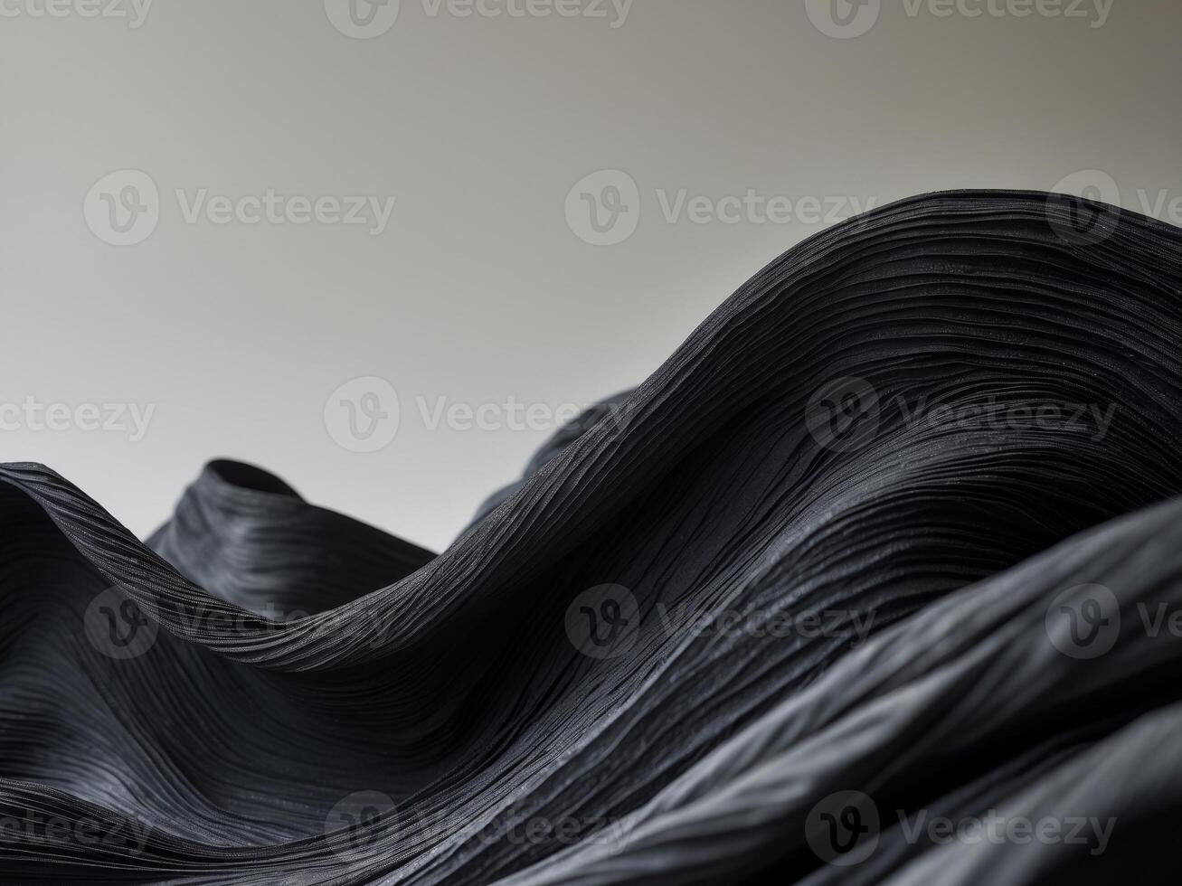 Textured black waves of flowing materialTextured black waves of flowing material. photo