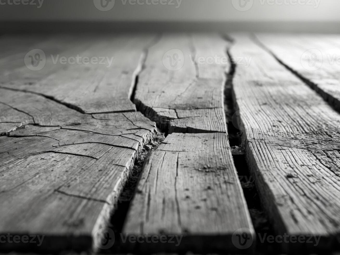 Old wood on the floor separating at the seams from wear and tear photo