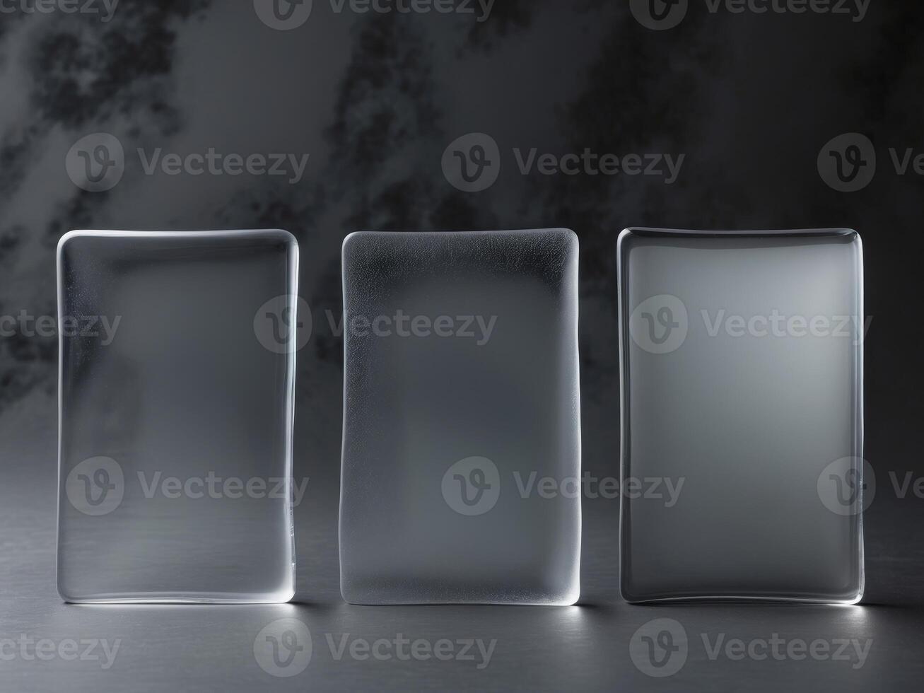 Three rectangular glass pieces are shown in a black backgroundThree rectangular glass pieces are shown in a black background. photo