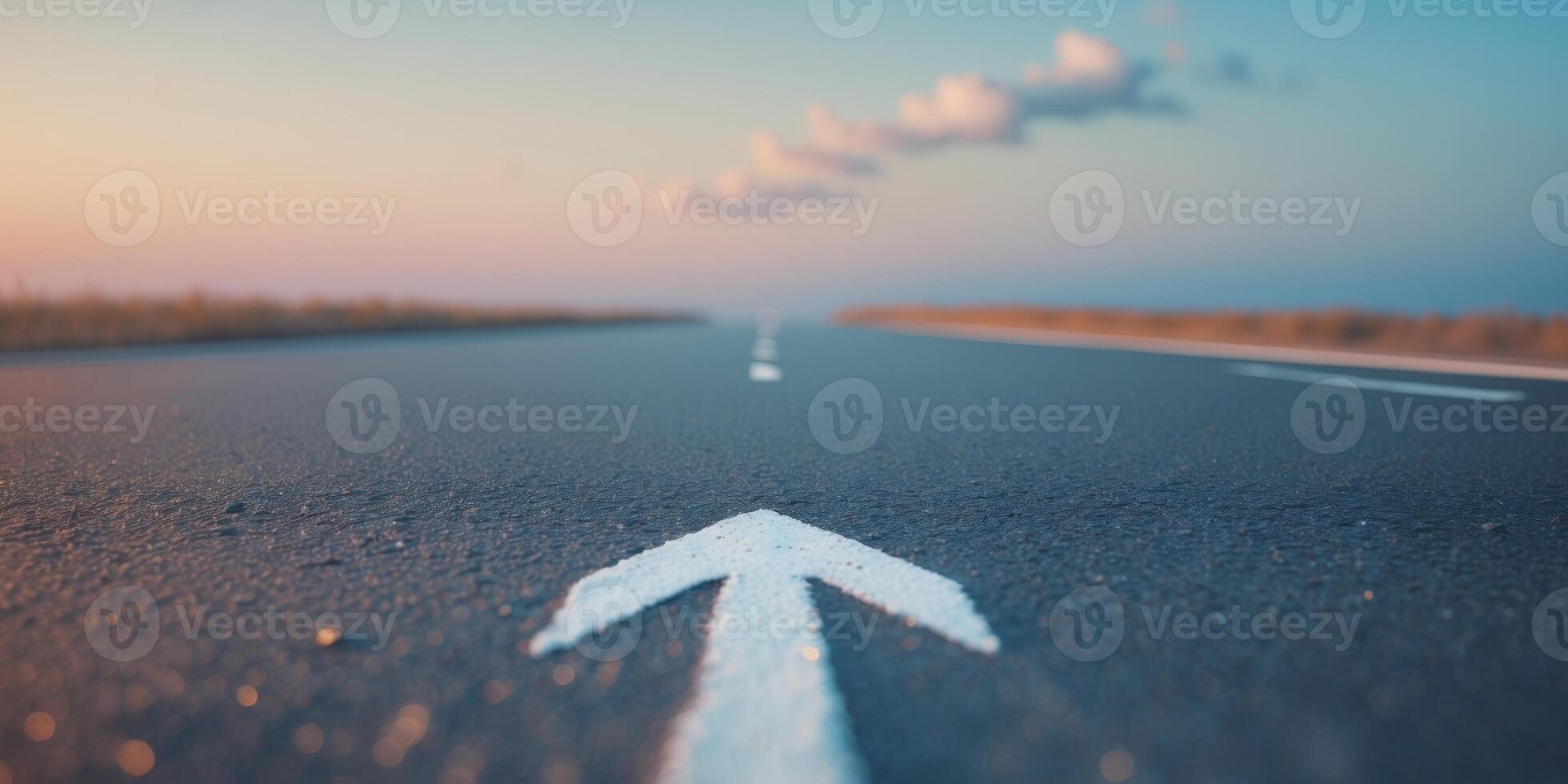 Asphalt Road with White Arrow Forward Symbolizing Motivation and Progress in Golden Hour Lighting photo