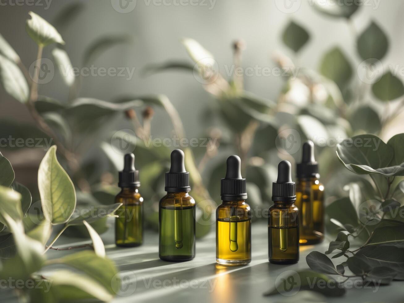 Essential Oils in Elegant Dropper Bottles with Greenery photo