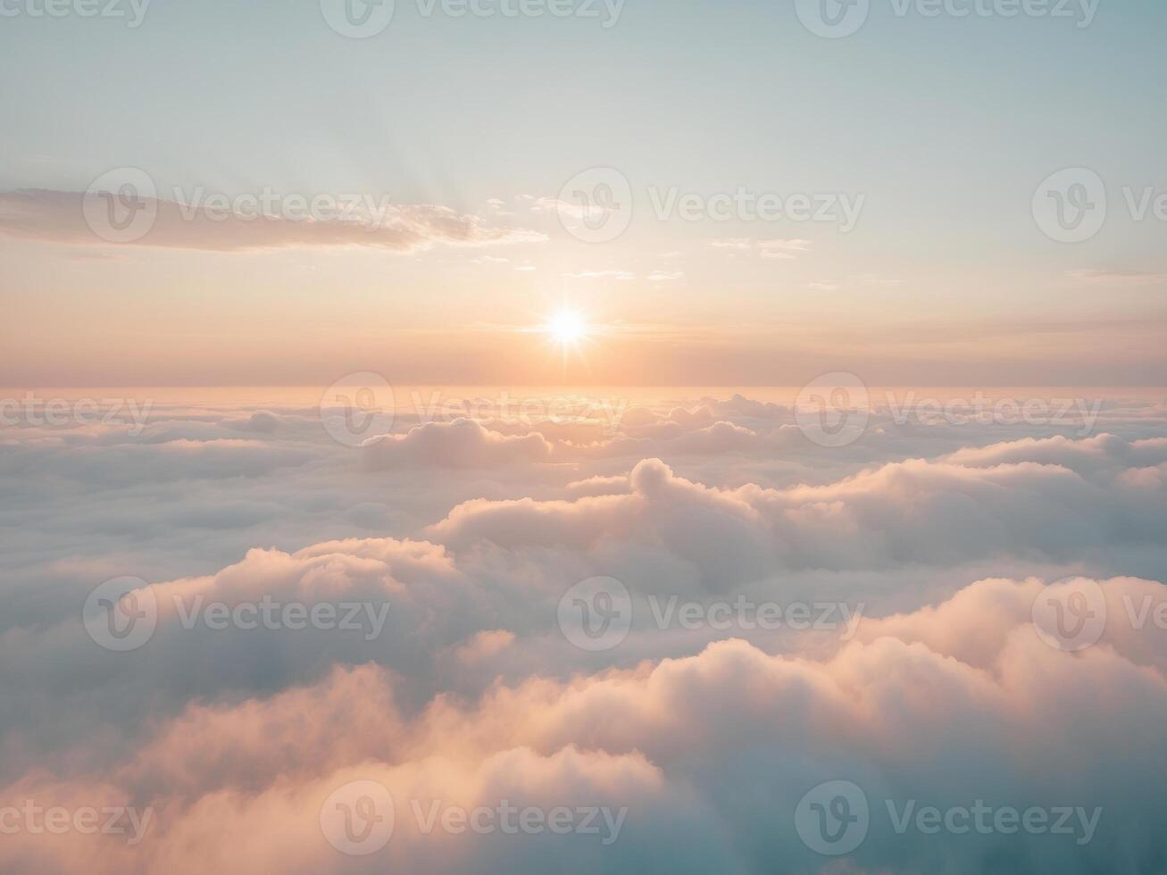 Majestic Sunrise Above a Sea of Clouds with Golden Rays photo
