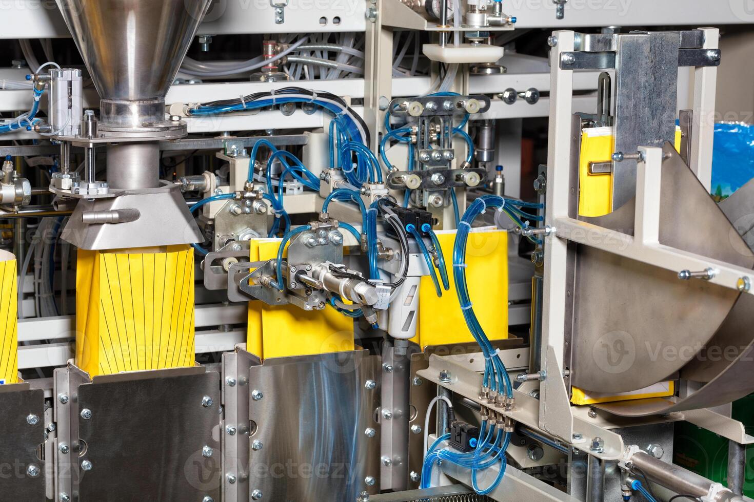 Automatic conveyor in the food industry for packaging bulk products. photo