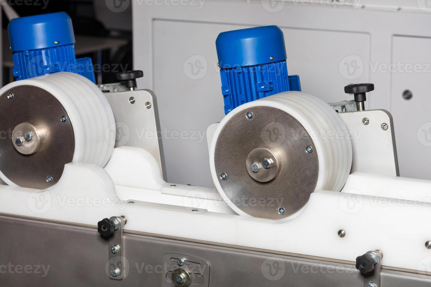 Rollers of a conveyor line used in the food industry. photo