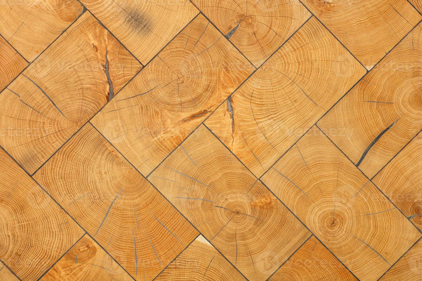 Beautiful wooden background made of natural cross sections in the form of even rectangles. photo