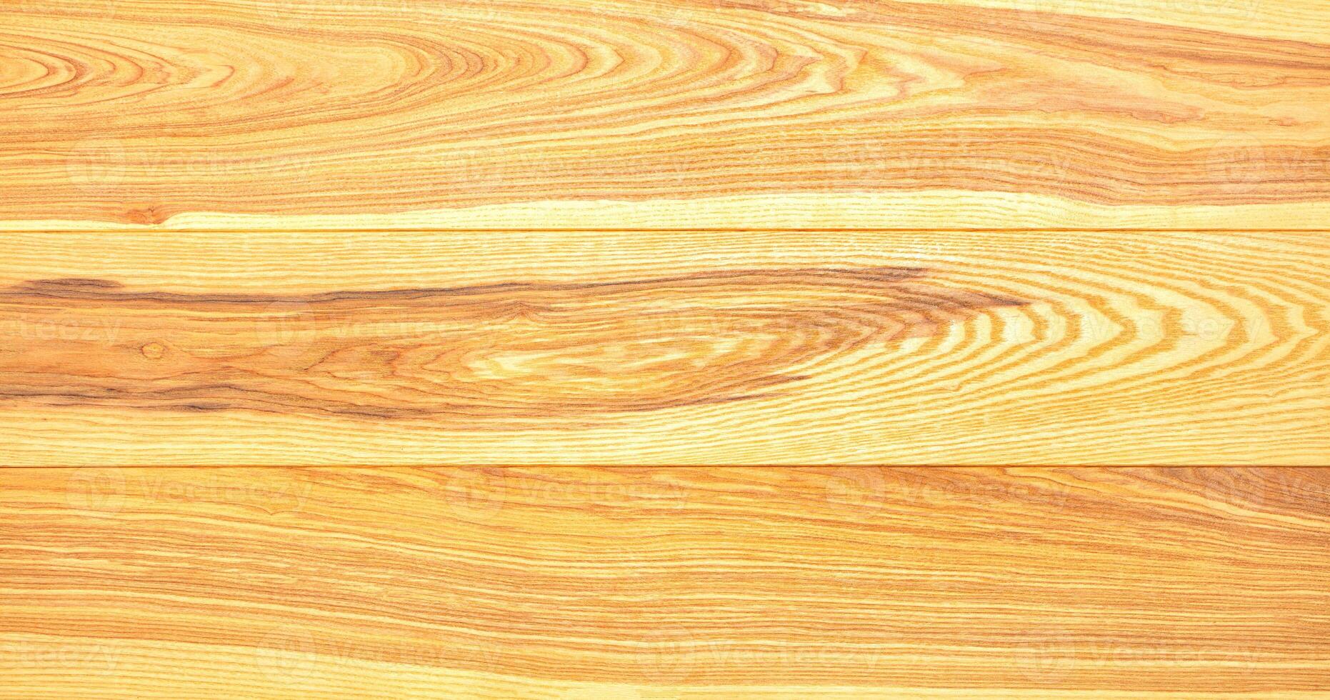 The texture of pine boards with a pronounced pattern of wood fibers. photo