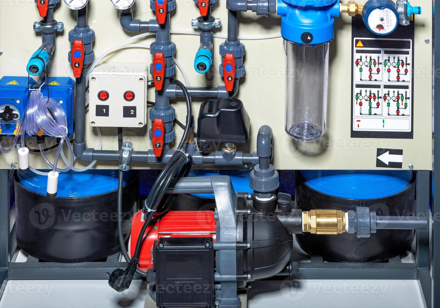 Surface centrifugal pump against the background of the water supply wiring diagram. photo