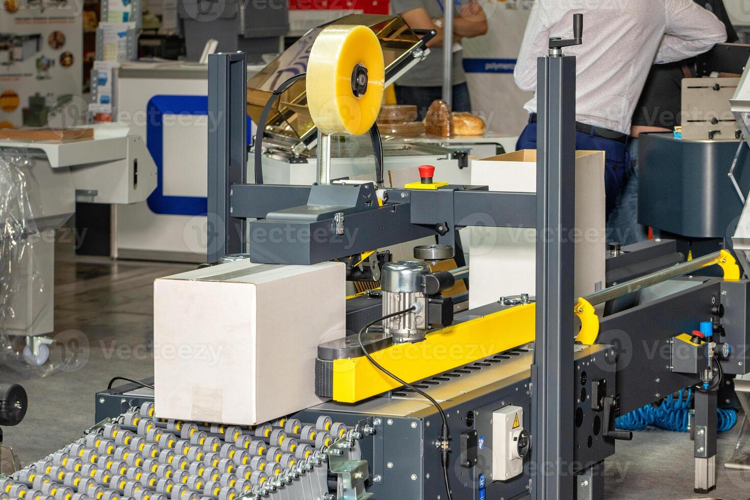 Fragment of an automatic packaging conveyor production line. photo