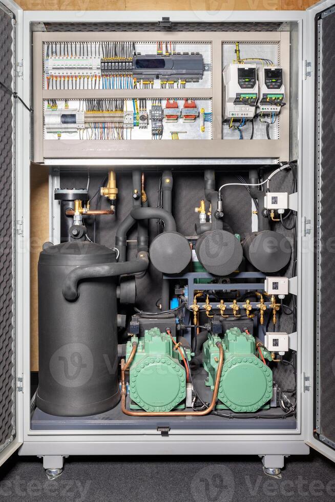 Refrigeration equipment of a compressor-condenser station with an electronic controller unit. photo