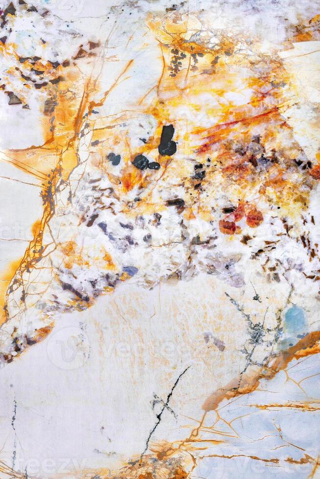 Beautiful marble texture interspersed with orange onyx. Vertical image. photo