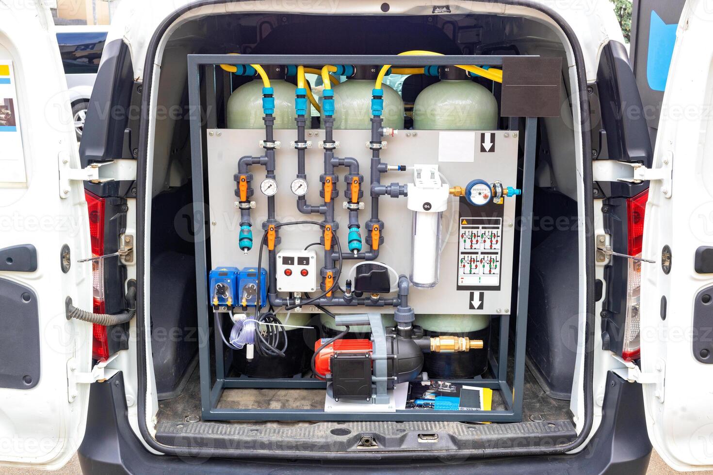 Portable water filtration system in van, showcasing industrial design and functionality of filtration equipment, water purification, technology concept photo
