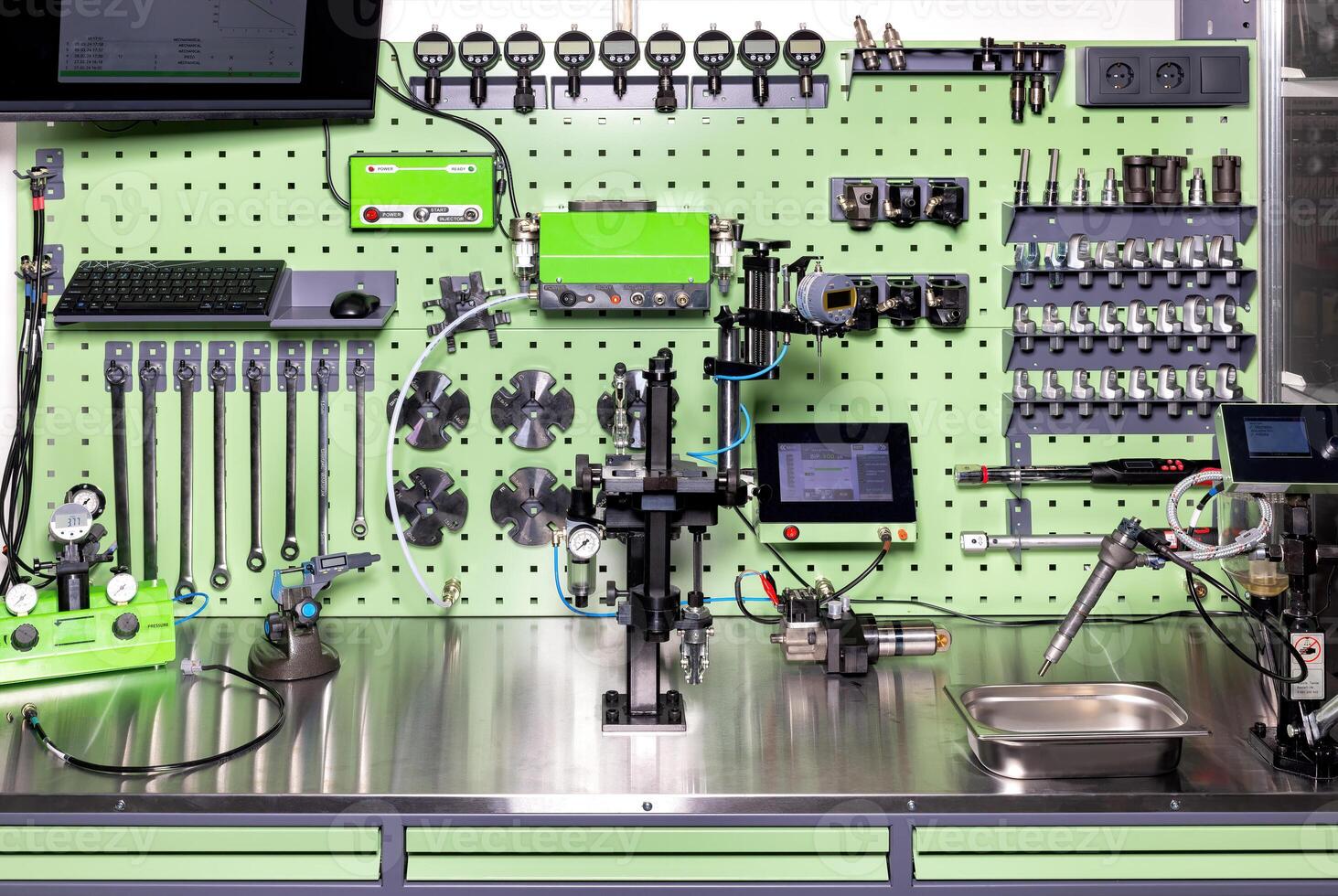 Advanced diagnostic tools and modern industrial equipment in workshop setup in an organized workplace, the concept of machine calibration. photo