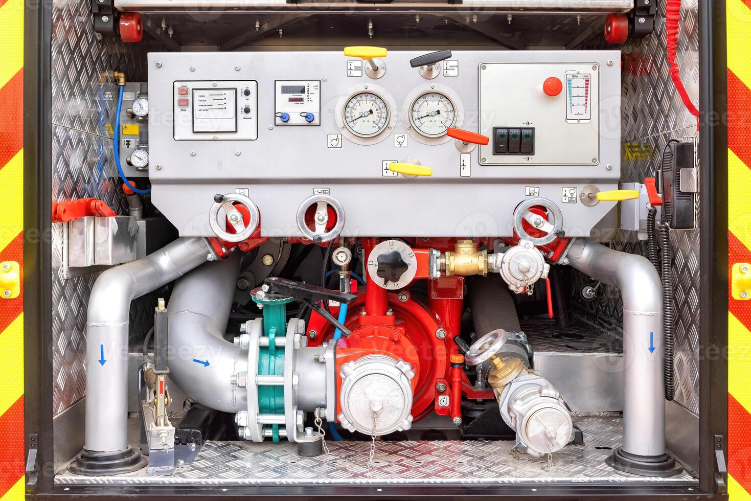 Detailed view of fire truck's hydraulic control panel, levers and gauges in emergency vehicle, focus on operation concept photo