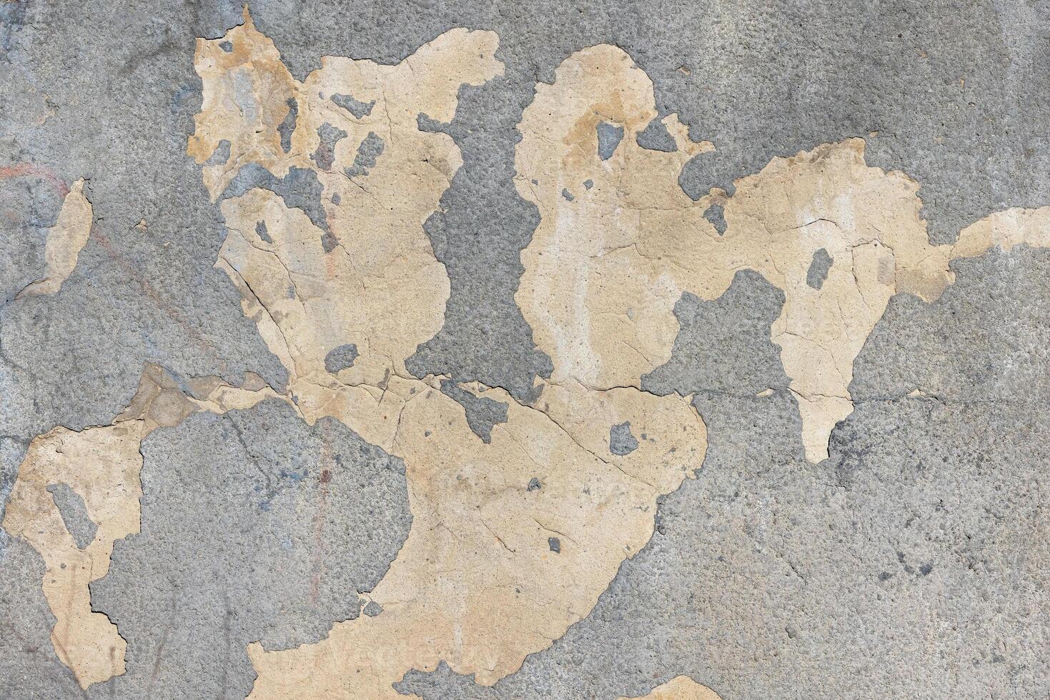 Ancient texture reveals a world map on cracked concrete surface in urban setting photo