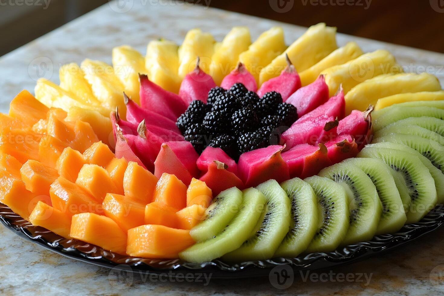 Catering showing sliced pineapple, cantaloupe, kiwi, dragon fruit, and blackberries arranged on platter photo