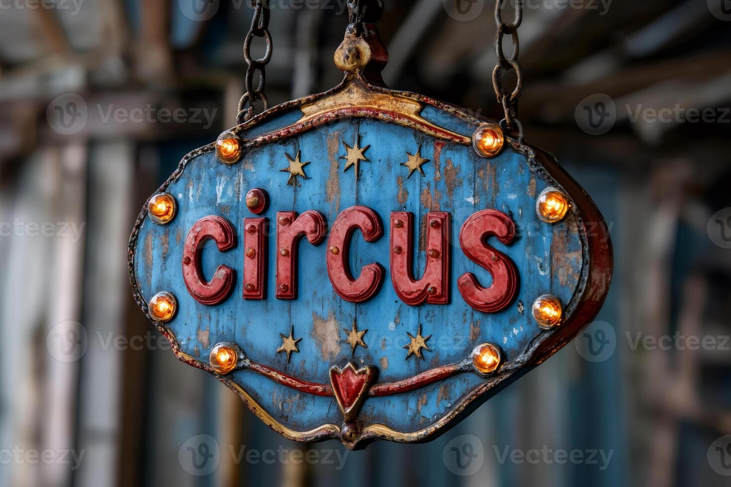 Vintage circus sign hanging with illuminated light bulbs photo