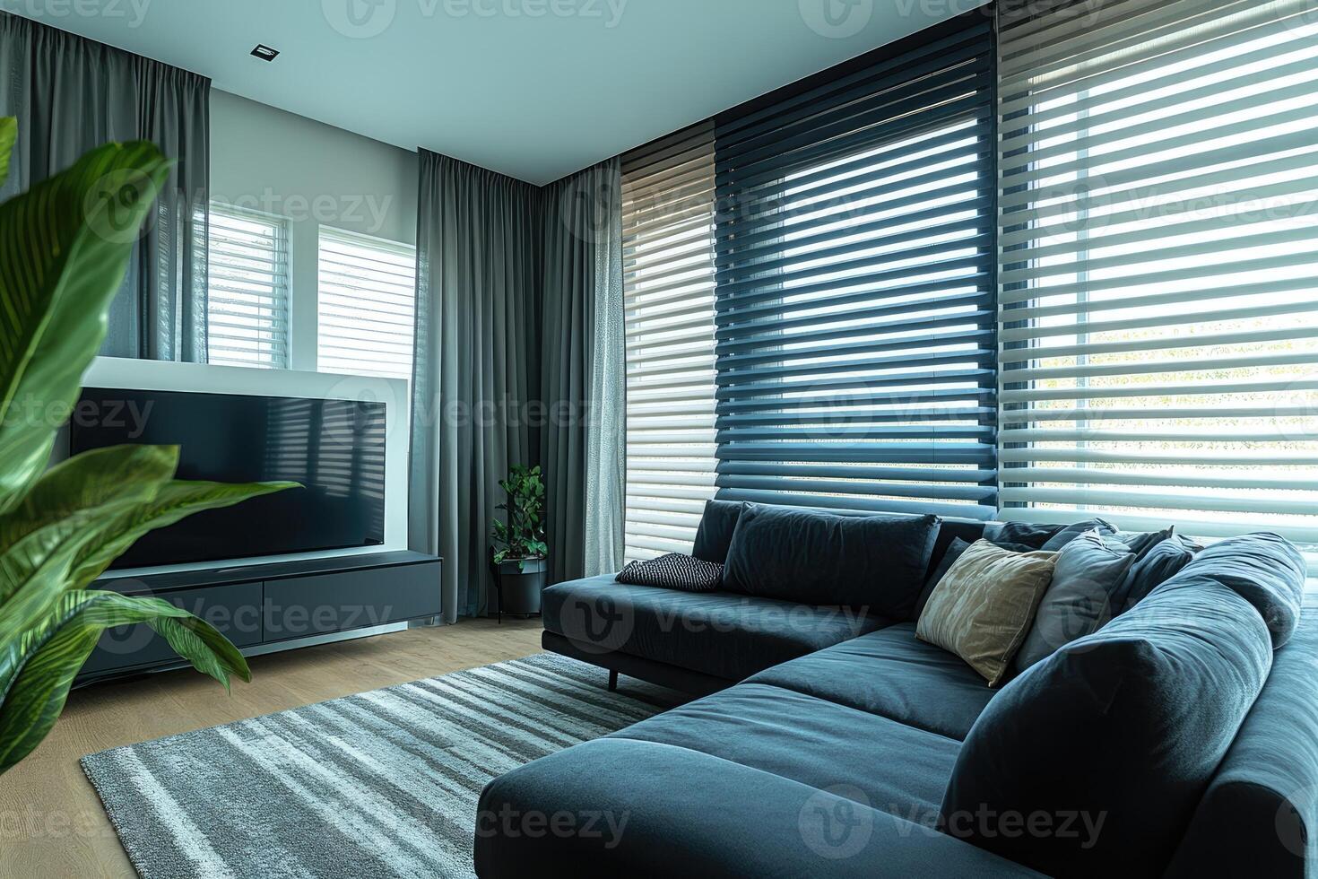 Modern living room interior design featuring stylish sofa, tv and venetian blinds photo