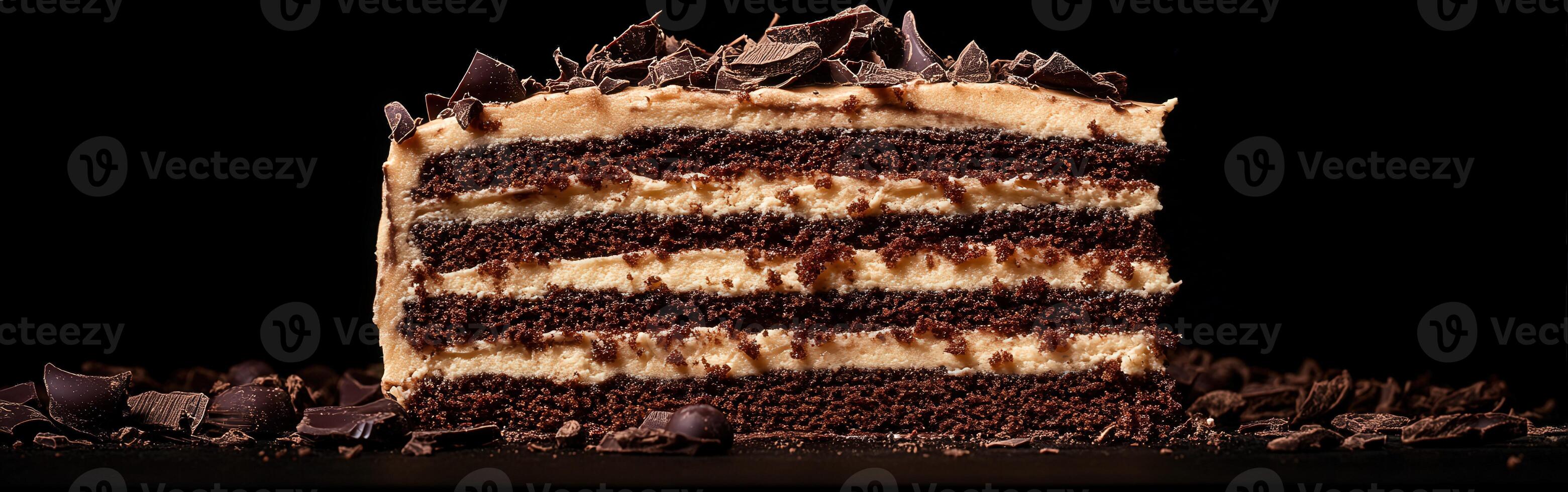 Chocolate layer cake with rich frosting and dark chocolate shavings photo