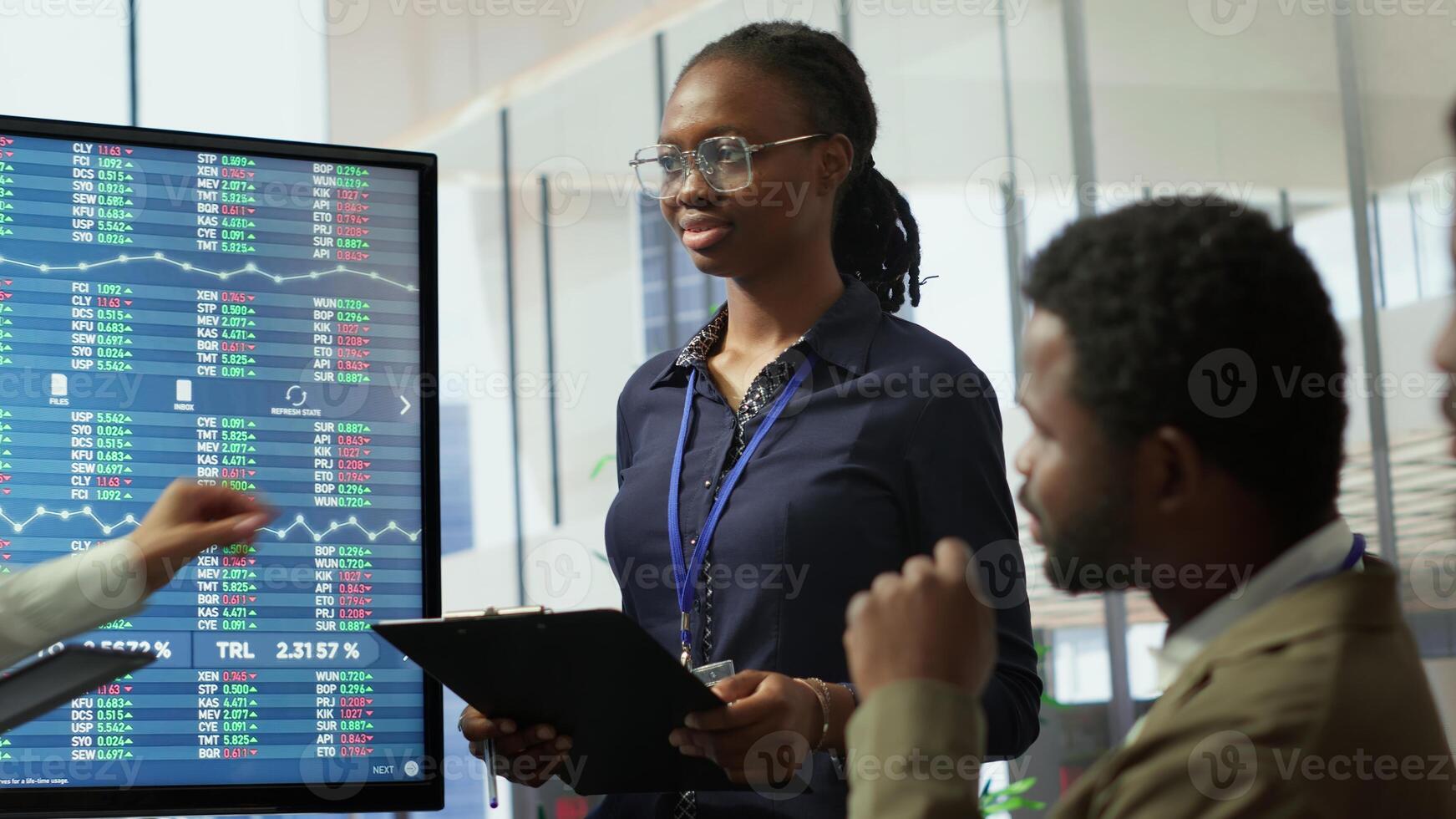 Team of company analysts reviews feedback on sales to work on future improvements, developing marketing and PR strategies in meeting room. Startup enterprise affiliates. Camera A. photo