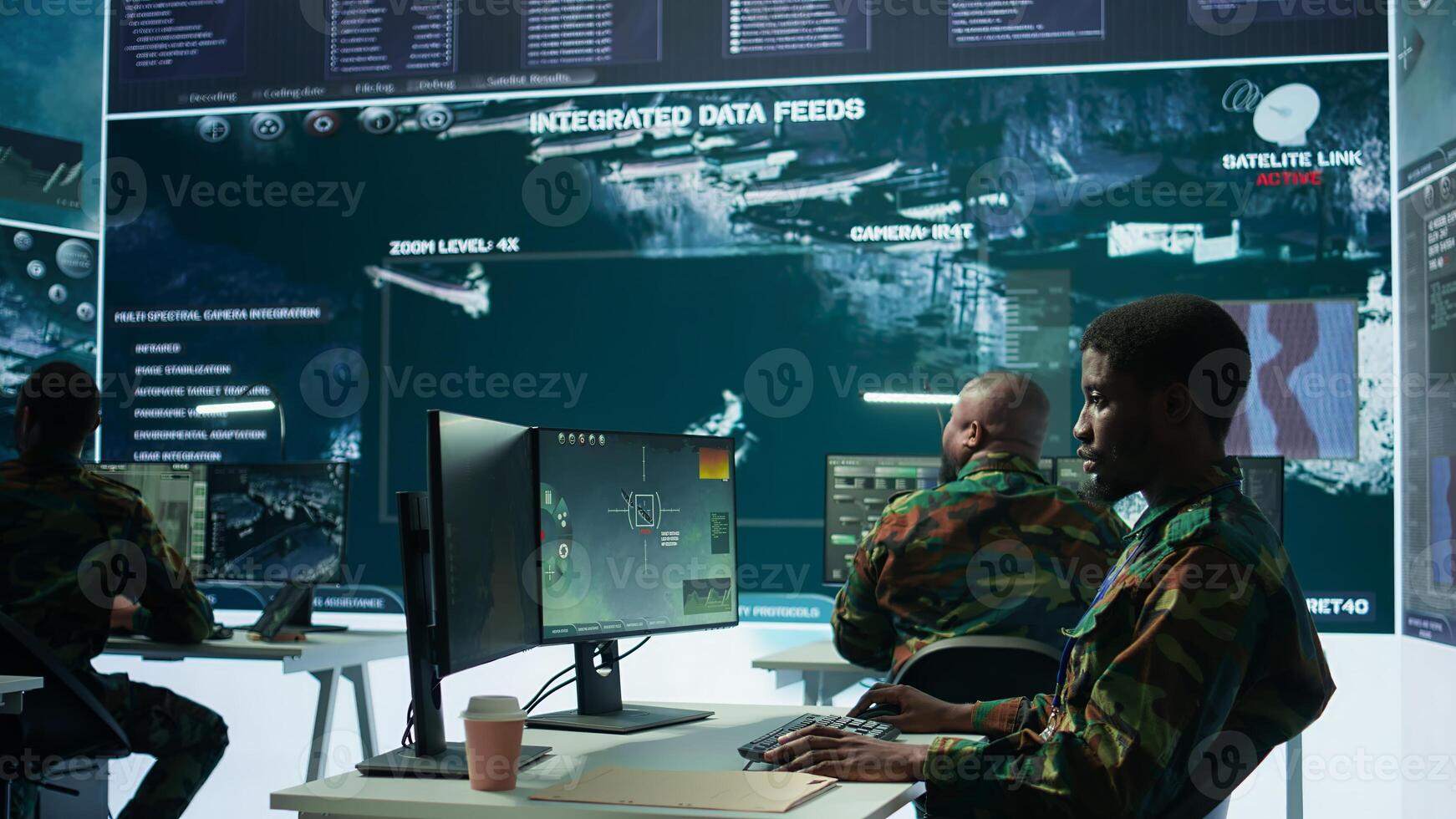High tech military office with soldiers analyzing real time data, processing intelligence information and coordinating strategic operations to support army field missions effectively. Camera B. photo
