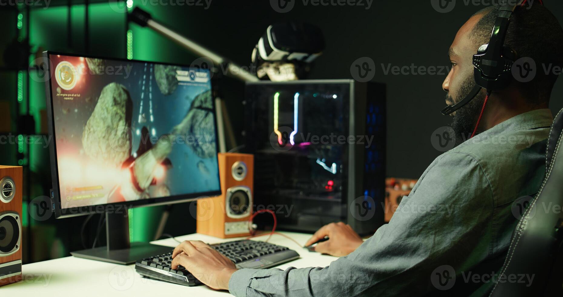 Player at home shooting asteroids in spaceship flying singleplayer game with overlay HUD showing health levels on monitor. Close up of person navigating universe in simulation game on PC photo