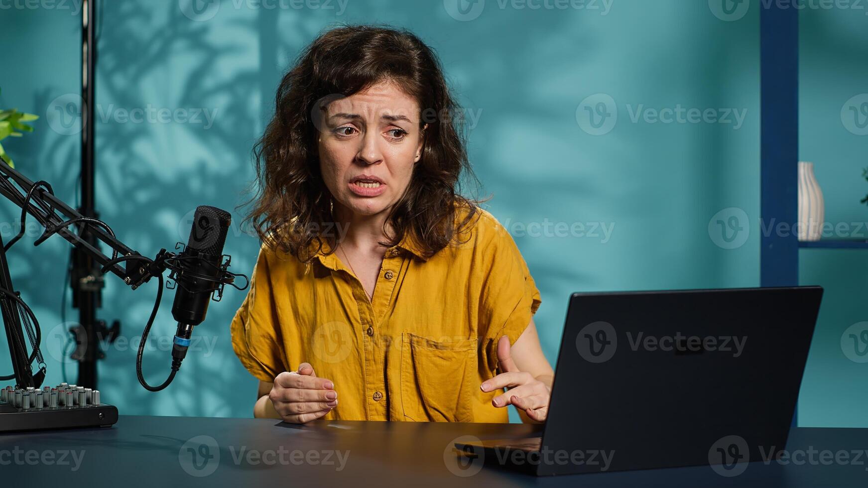 Influencer feeling angry, sharing concerning story during social media , talking to fans. Frustrated content creator talks with viewers, having mental breakdown in front of subscribers, camera A photo
