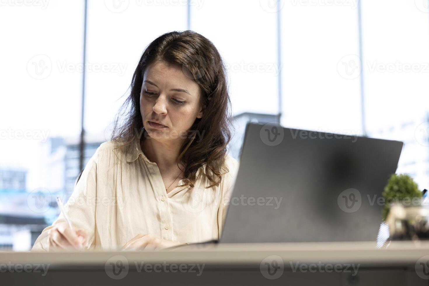 Business director signing contracts and paperwork to approve the daily activity for enterprise management and development. Female CEO working with legal documents, authorization. photo