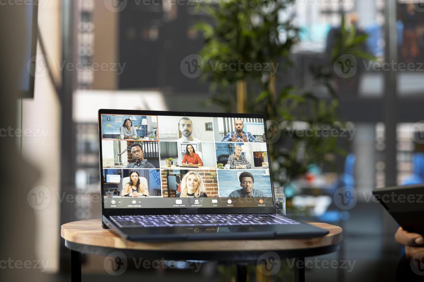 Manager using laptop, discussing with collaborators working from home in online teleconference, checking progress done on project. Man with workers in online remote videocall doing business audit photo