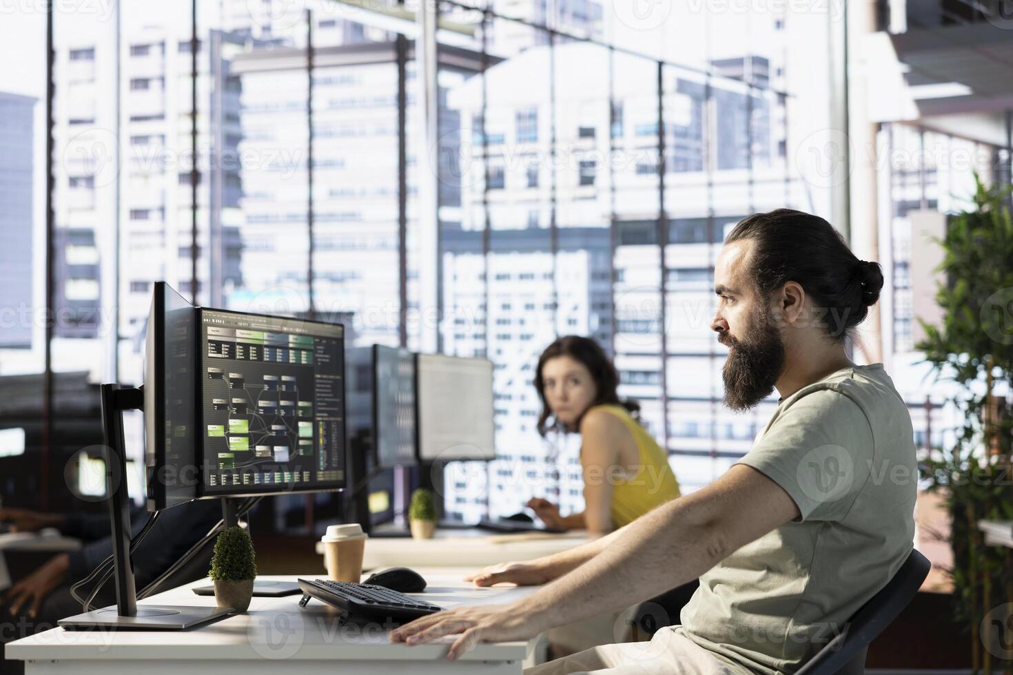 Full stack developer conducting experiments and tests to optimize machine learning models for performance and accuracy. IT expert in modern office analyzing and interpreting complex data photo