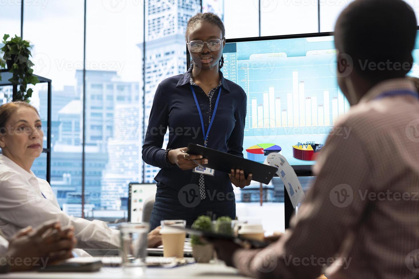 PR team presenting infographics and digital marketing insights for growth, showcasing the impact of recent campaigns and outlining plans for future development initiatives in workspace. photo