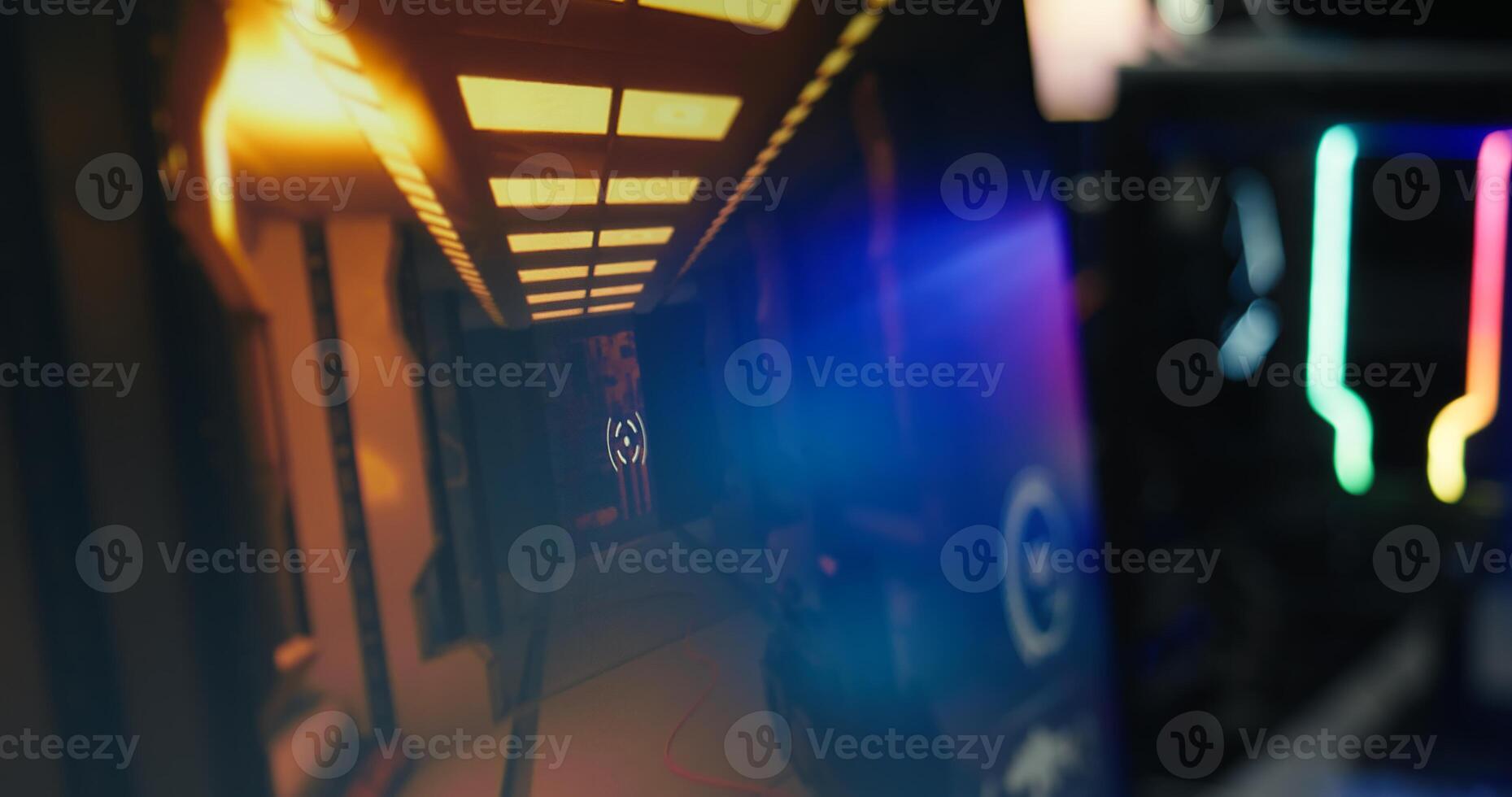 Computer screen showing FPS videogame with futuristic weapon shooting laser bullets at flying robots. Extreme close up of POV shooting videogame on PC in living room with no people in photo