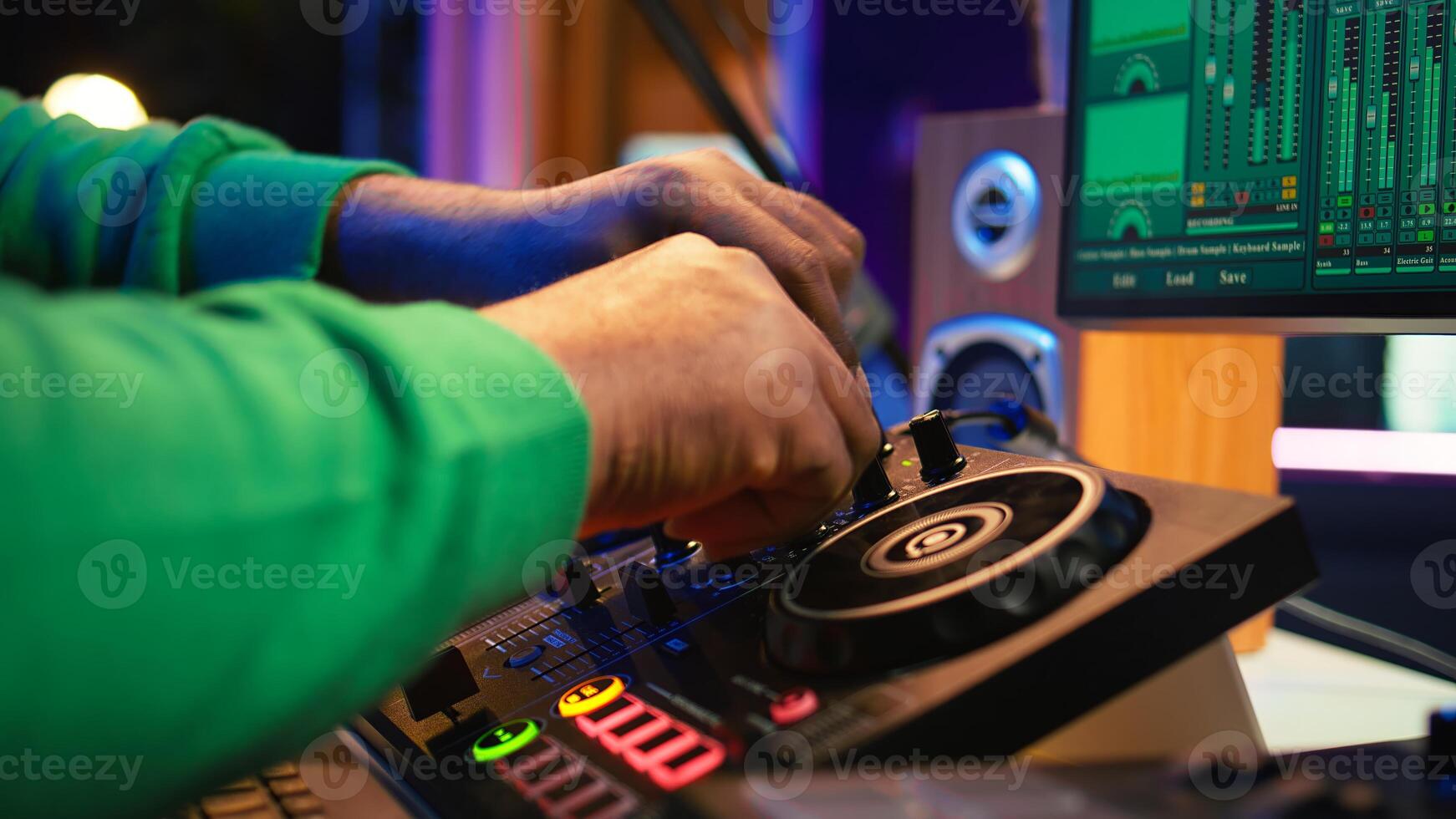 Audio engineer with headset mixing and mastering his recorded files, operating on a professional soundboard in home studio. Artist producer composing new tracks with sound effects. Camera B. photo