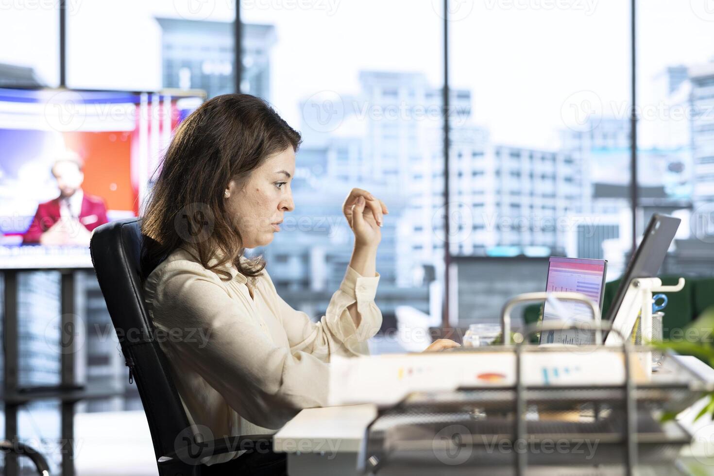 Woman general director managing multiple expansion projects, showcasing her multitasking abilities, organizational and leadership skills. CEO working with commitment to business success. photo