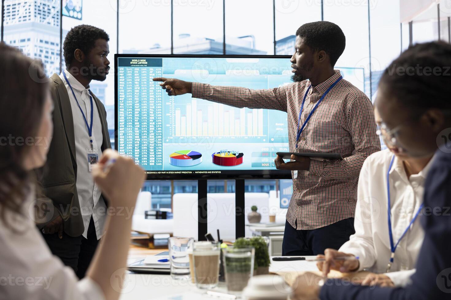 Enterprise colleagues making a pitch in order to obtain funds in a meeting with investors, Business associates convene for a strategy session, utilizing interactive boards to visualize data. photo