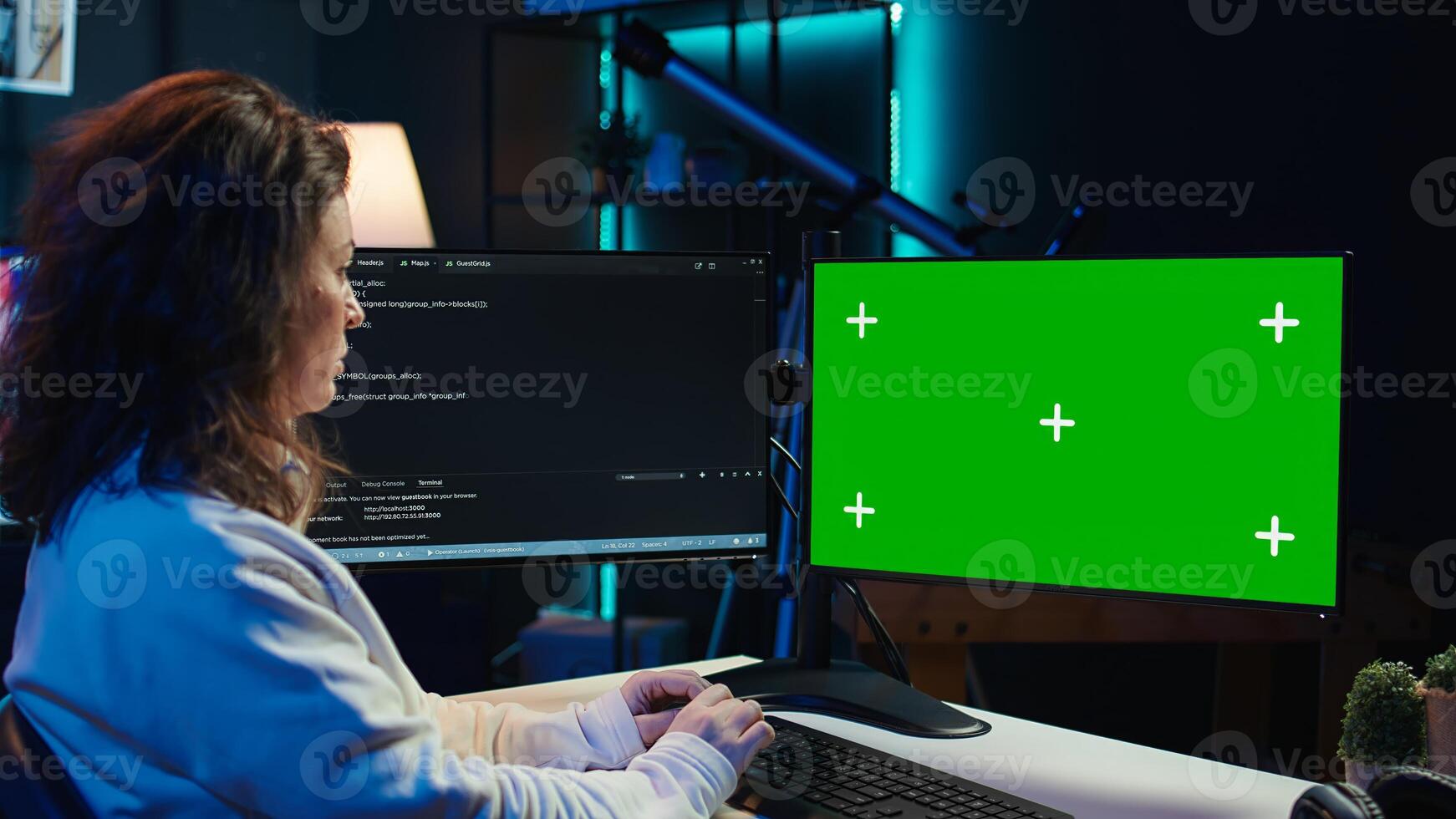 Cybersecurity expert uses green screen computer to look for security vulnerabilities and injected malware, close up. Admin installing fortified code on chroma key PC to prevent cyber attacks, camera B photo
