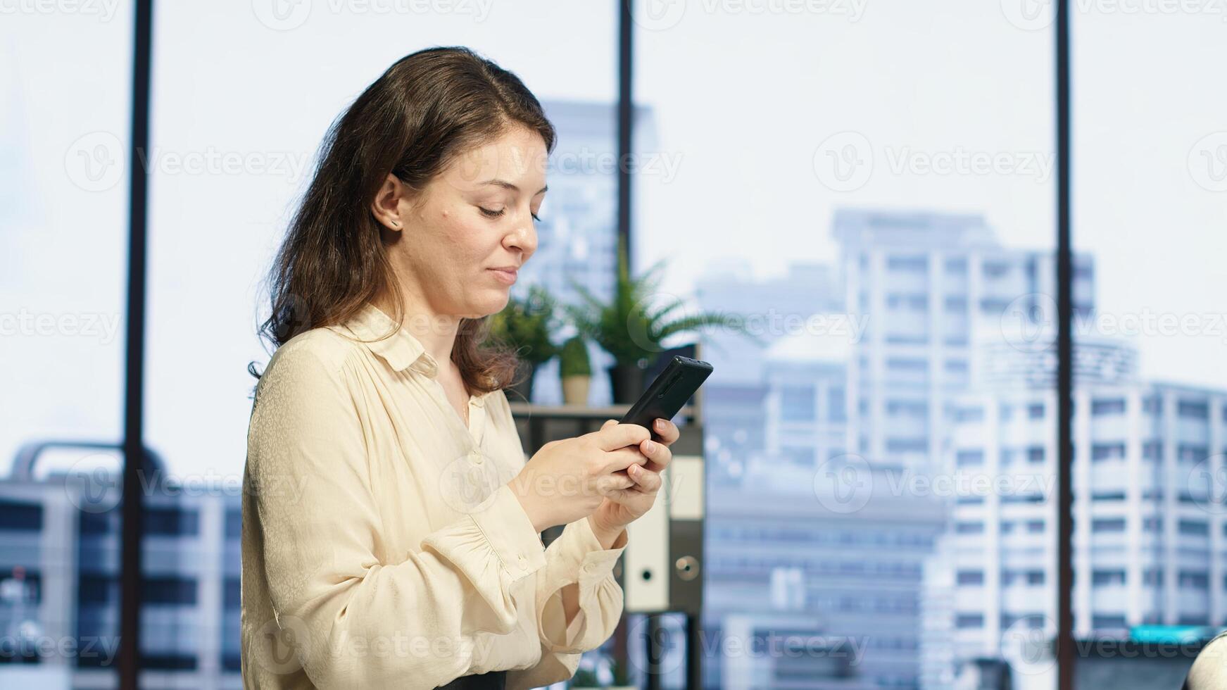 Portrait of goal oriented powerful CEO sitting on her office posing with authority and determination, successful career development and business achievements. Inspirational empowerment. Camera A. photo