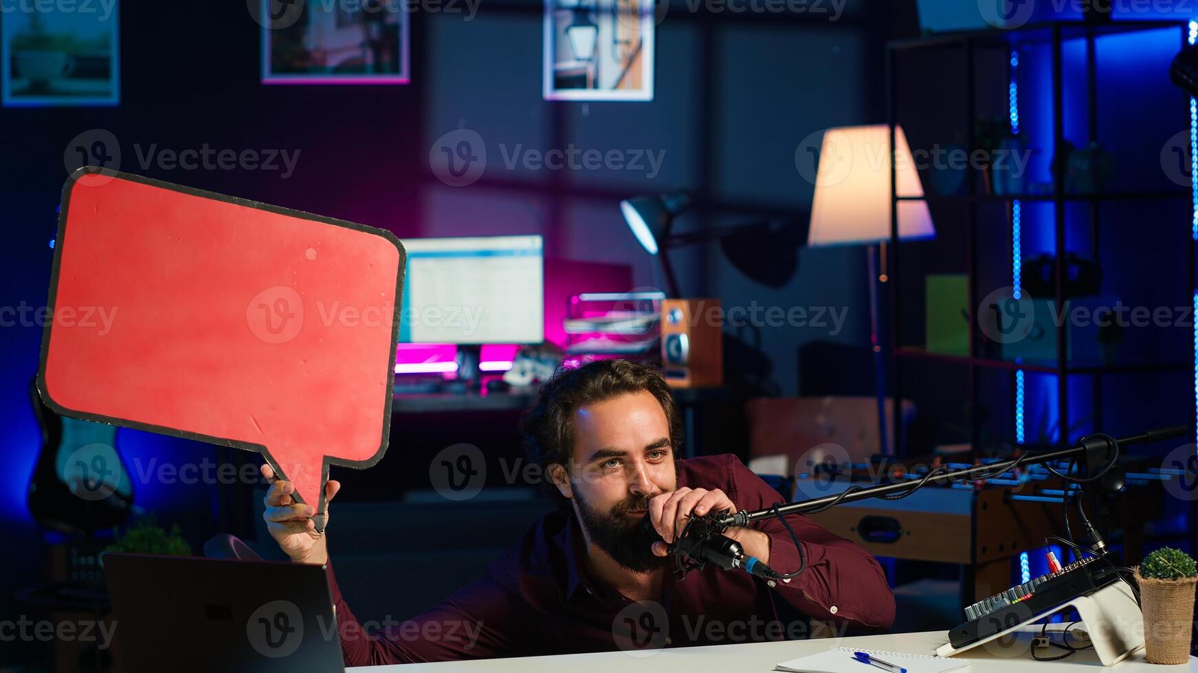 Influencer filming sponsored content, holding empty copy space sign, doing thumbs up sign. Internet star using cardboard bubble speech cutout to do promotion, doing positive gesturing, camera A photo