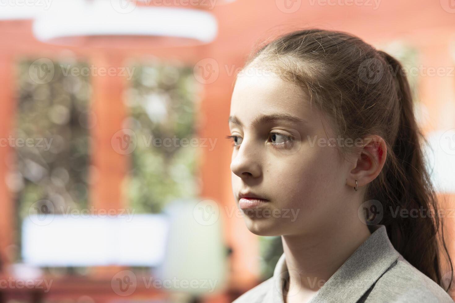 Young girl in a confidential therapy session discussing personal challenges like anxiety, social issues and depression. Psychologist supports her emotional well being and mental resilience. Close up. photo