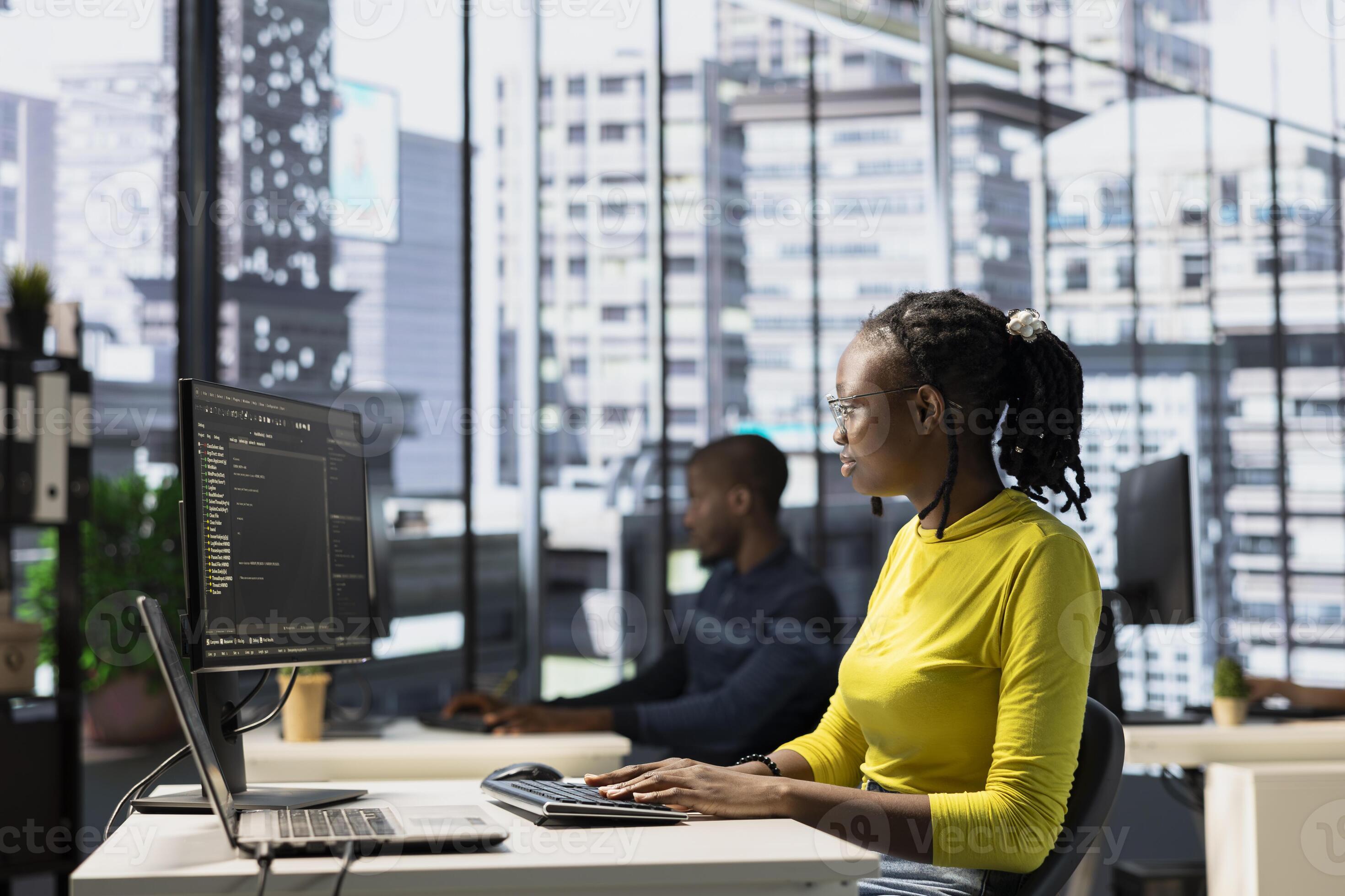 IT worker coding in programming languages to construct algorithms and ...