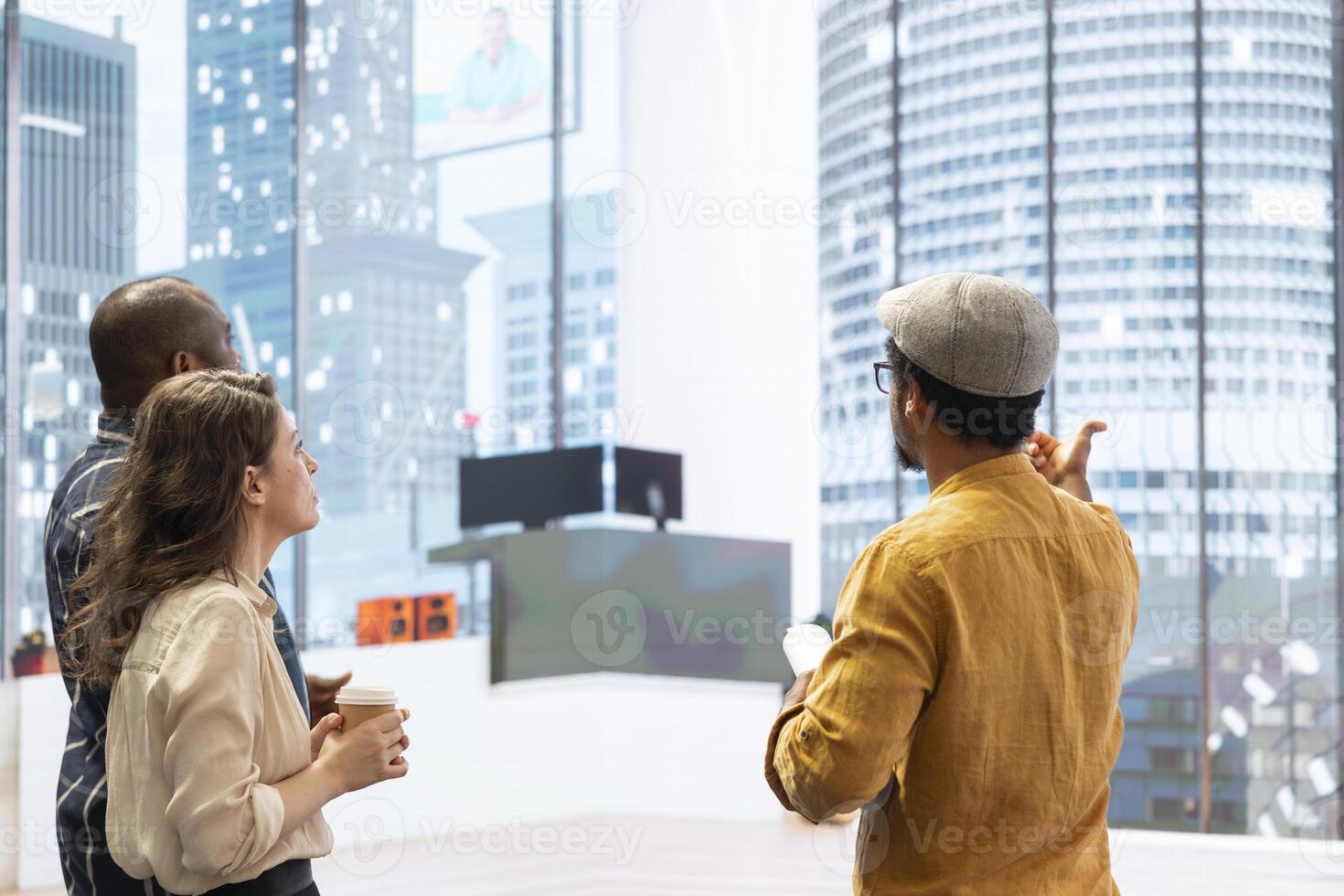 Business clients discussing design and layout of a new office space ...