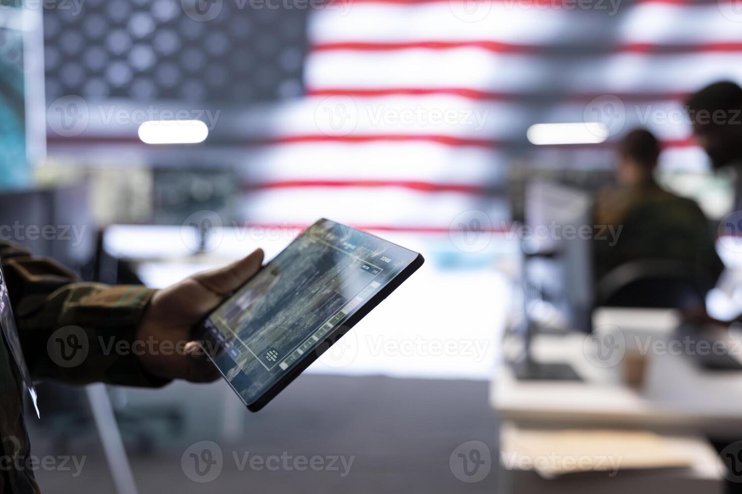 Military officers monitoring national safety operations from a high tech command post, managing surveillance data and ensuring security through advanced intelligence systems. Close up. photo