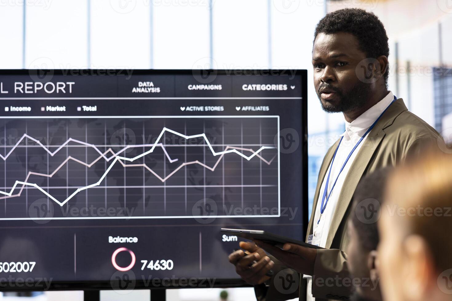 In a high end boardroom, employees gather to brainstorm ideas and create strategies, analyzing statistics to drive business development and ensure successful project management. Enterprise solutions. photo