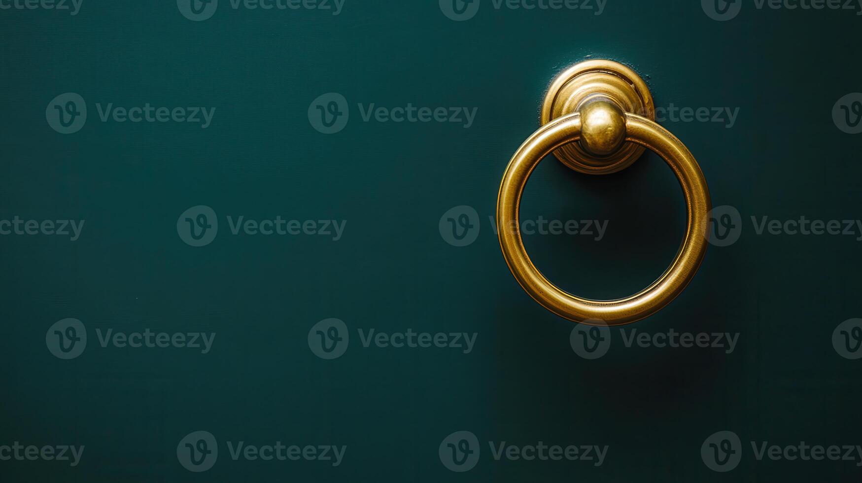 Elegant golden door knocker on a dark green entrance, inviting visitors and adding charm to the overall decor photo