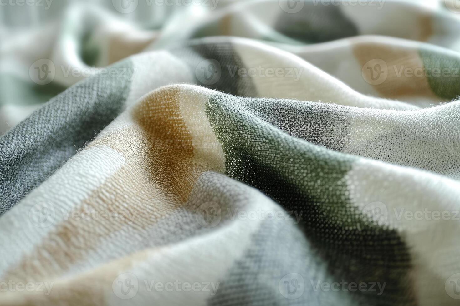 Soft plaid blanket with folds creating cozy texture . photo