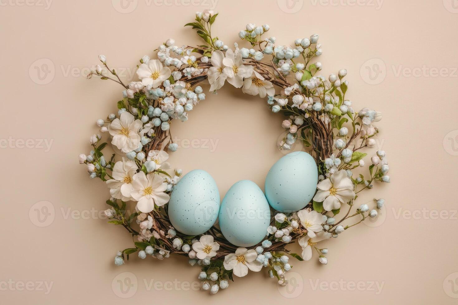 Easter wreath with light blue eggs and white flowers on beige background photo