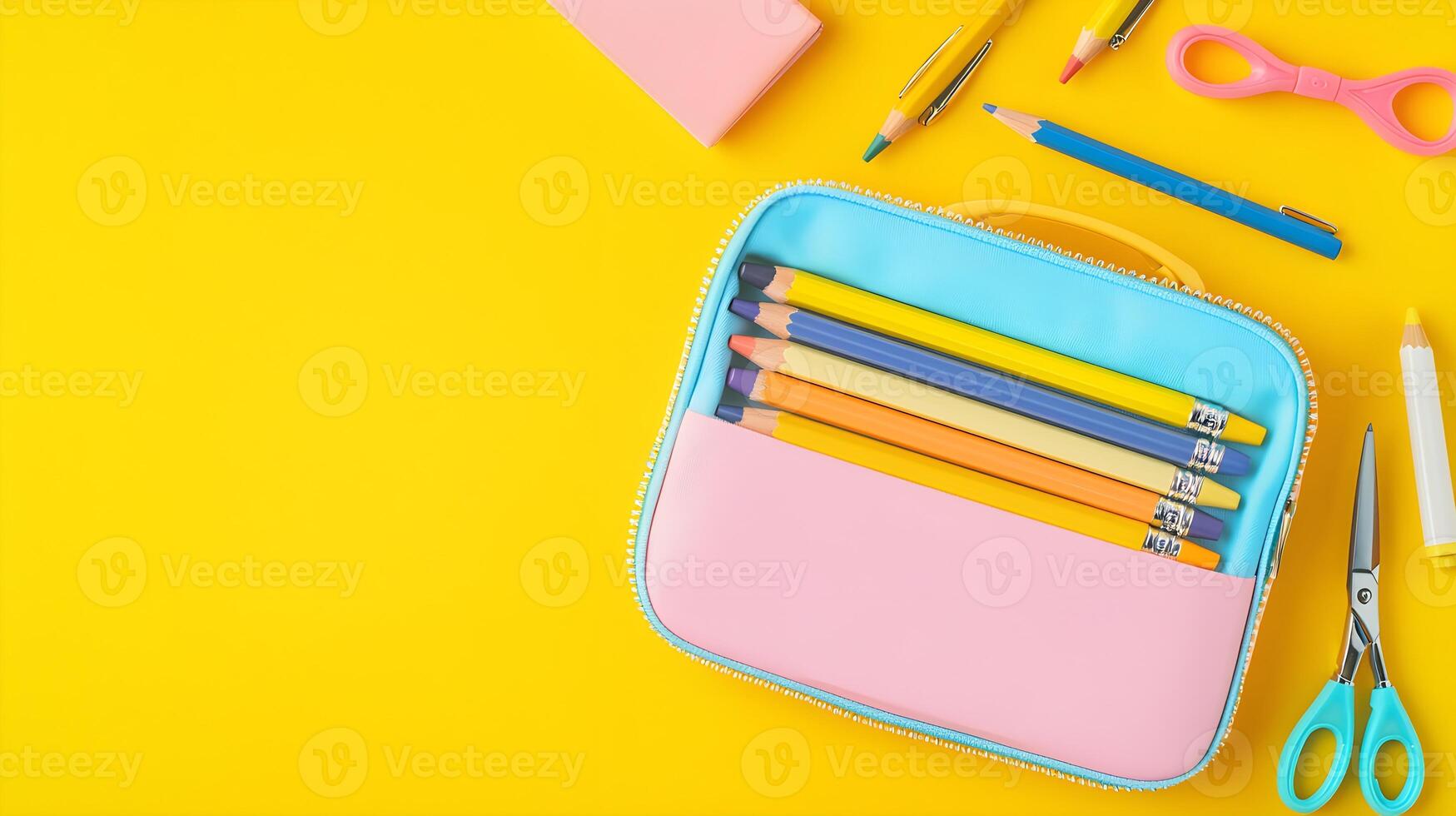 Colorful Pencil Case with Stationery on Bright Yellow Background photo