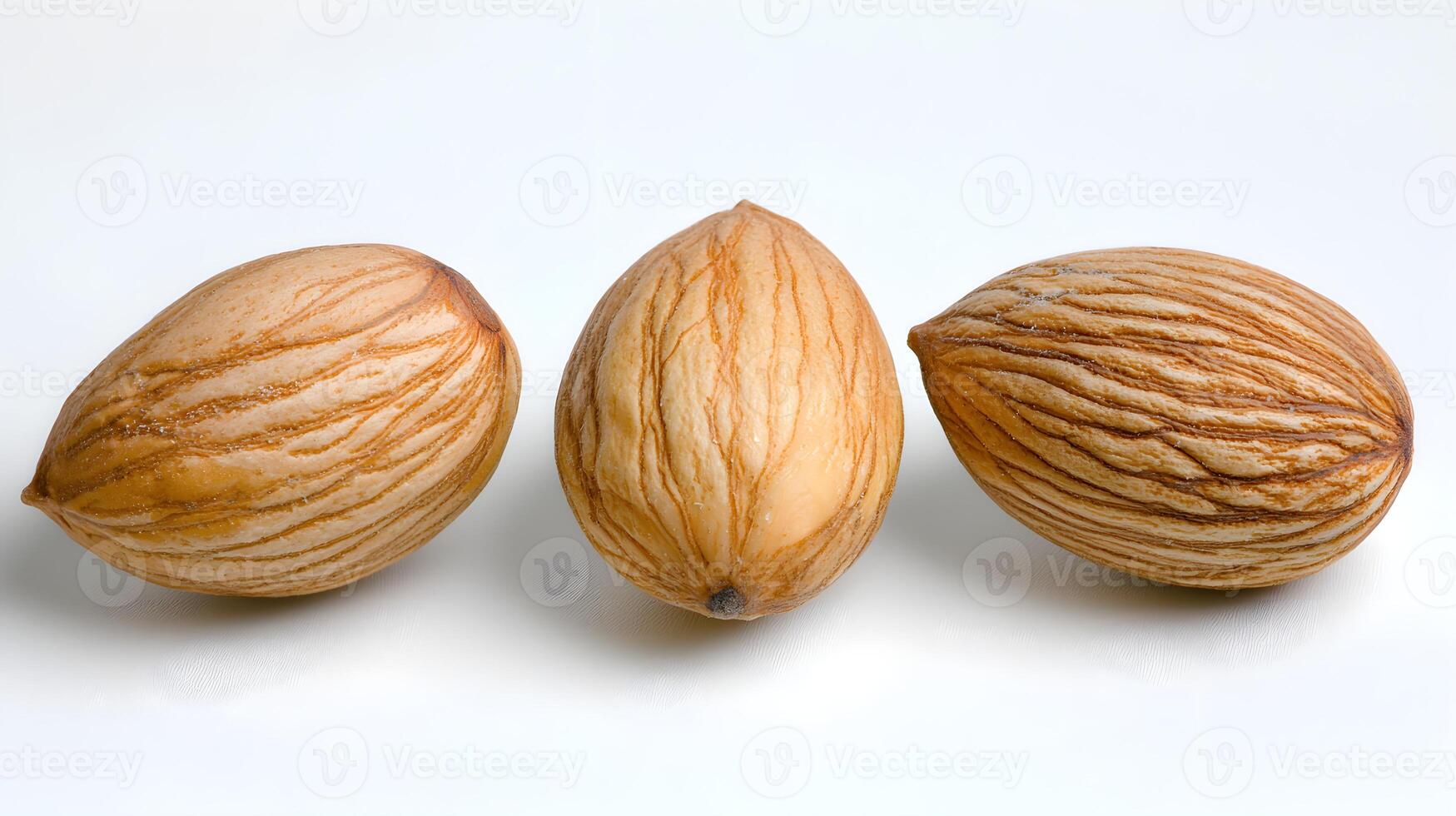 Three Striped Exotic Nuts on a White Background Close-Up photo