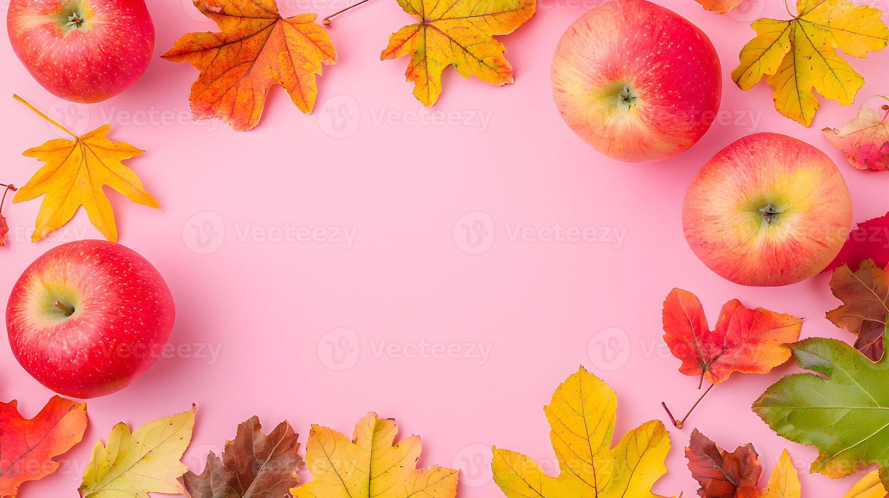 Fresh Red Apples Surrounded by Colorful Autumn Leaves on Pink Background photo